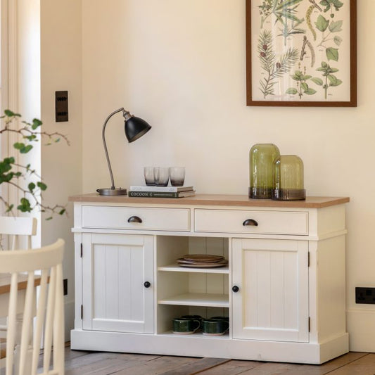 Gallery Direct Eton white sideboard features 2 side cupboards, 3 open shelves and 2 spacious top drawers in White painted wood, with a oak veneered top