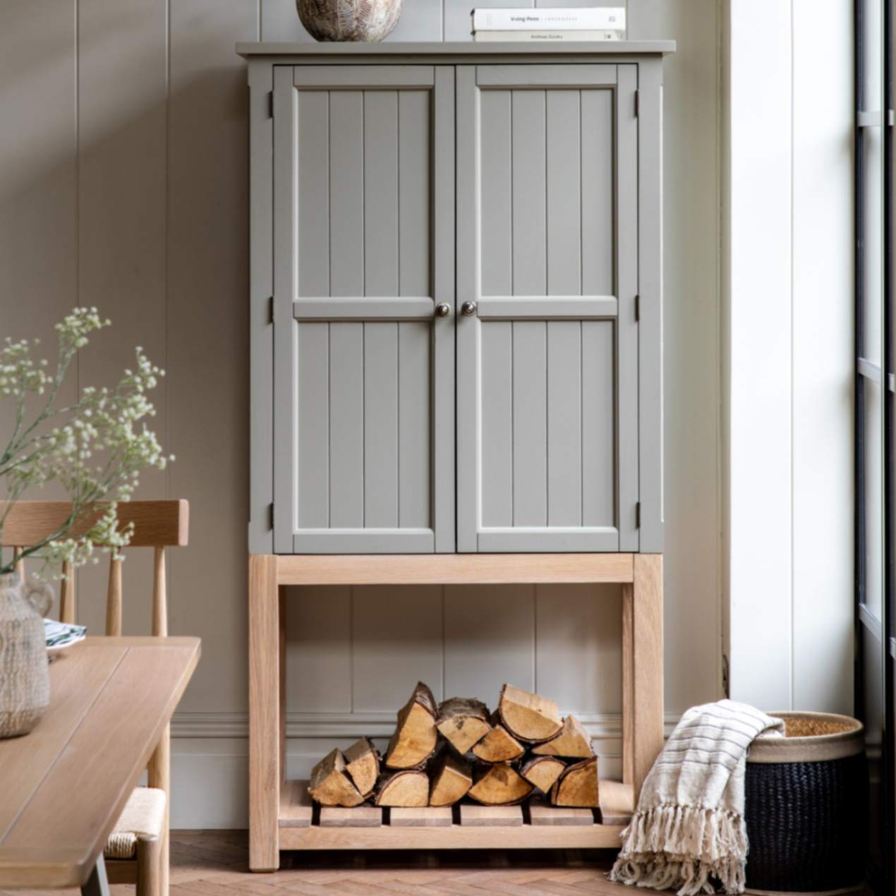Gallery Direct Eton 2 Door Cupboard in Prairie features spacious upper cupboard with shelves and a large lower shelf 