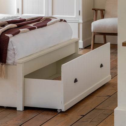 Eton white bed with its large under-bed storage drawer open