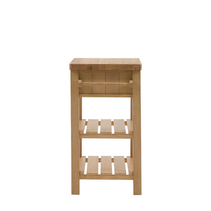 Gallery Direct Eton Butchers Block in Natural features a solid oak wood worktop, side hanging rails and lower planked shelves