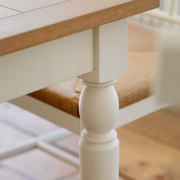 Gallery Direct Eton Extending Dining Table with a white painted wood frame and a natural finish table top
