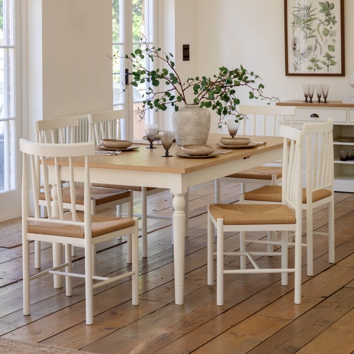 Gallery Direct Eton Rectangular Extending Dining Table in White painted wood with a natural oak finished, grooved and planked table top, can seat up to 8 people when extended 