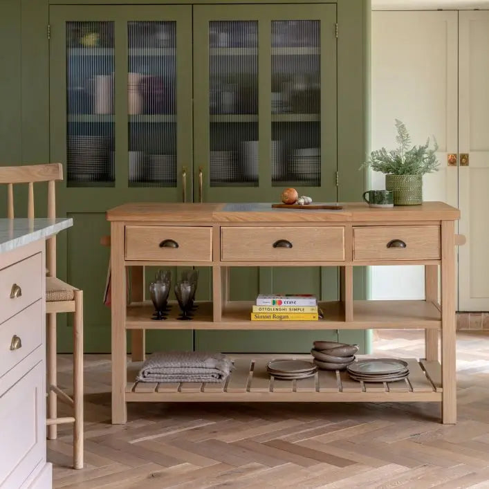 Gallery Direct Eton Kitchen Island in Natural, features 3 drawers, 3 open shelves and a lower planked shelf, crafted from oak, pine and veneers 