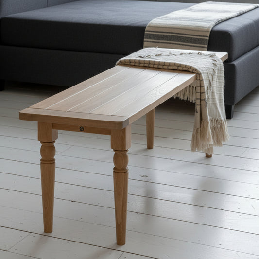 Gallery Direct Eton Oak Dining Bench crafted from oak wood and veneers with grooved seat and turned spindle legs