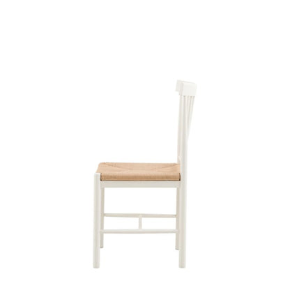 Gallery Direct Eton white Dining Chairs feature a natural coloured rope woven seat for a traditional farmhouse aesthetic