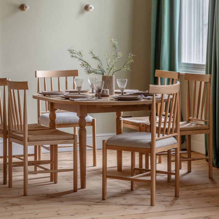 Gallery Direct Eton Round Extending Dining Table for 4-6 people is constructed from natural oak wood and veneers  with removable leaf extension system