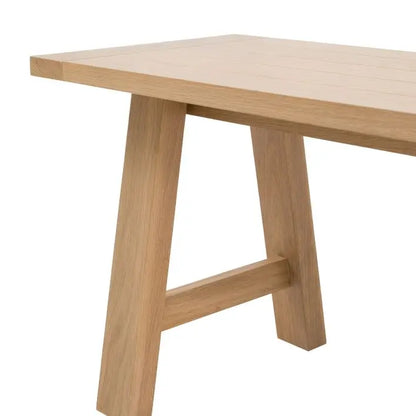 Gallery Direct Eton Trestle Bench in a Natural oak wood with angled timber underframe