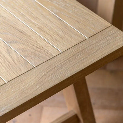 Gallery Direct Eton Trestle Bench features a grooved & planked oak seat and a trestle style base 