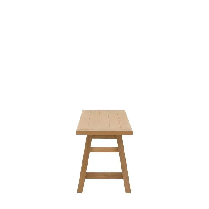 Gallery Direct Eton Trestle Bench in Natural oak wood and veneers, features a grooved wood seat and trestle style legs