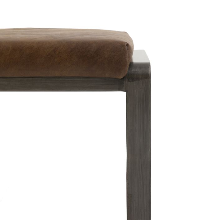 Gallery Direct Fabien Footstool upholstered in Brown Leather with dark metal legs