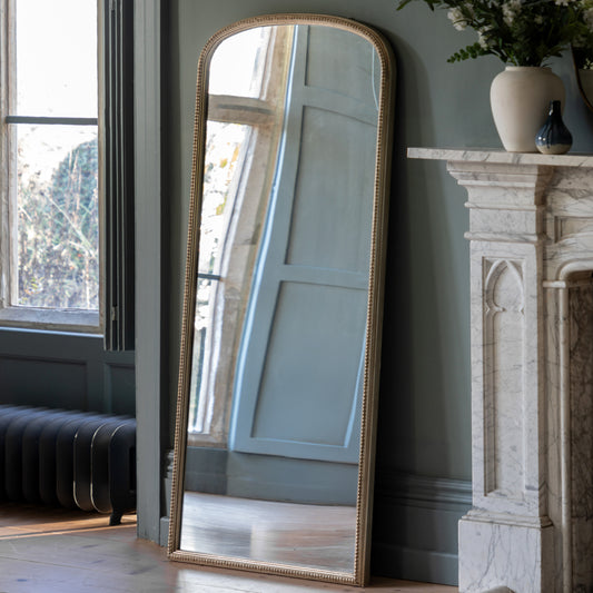 Gallery Direct Florentine Leaner Mirror Champagne displayed in a styled interior