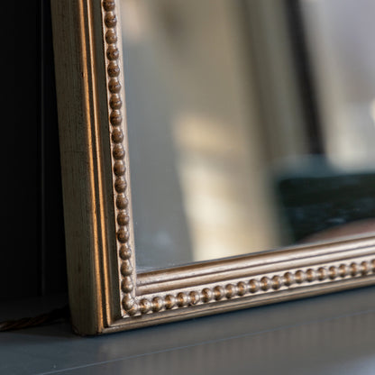 Gallery Direct Florentine Overmantle Mirror Champagne, close-up of the mirror and frame details