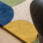 Gallery Direct Fulton Geo Wool Rug 1600x2300mm features a colour palette of green, blue, yellow and neutrals