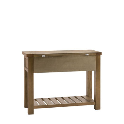 The Gallery Direct Hardwick 1 Drawer Console Table is crafted using solid oak wood and veneers with a natural grain pattern. 