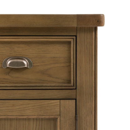 Gallery Direct Hardwick 2 Door 1 Drawer Sideboard constructed from solid oak wood and veneers with a warm natural wood finish, and metal handles