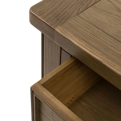 Gallery Direct Hardwick 2 Drawer Coffee Table constructed from solid wood and veneers with a warm, grain rich wood aesthetic