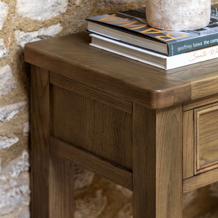 Gallery Direct Hardwick 2 Drawer Console Table crafted from solid oak and veneers in a natural warm wood finish with gently curved corners