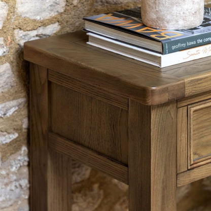 Gallery Direct Hardwick 2 Drawer Console Table crafted from solid oak and veneers in a natural warm wood finish with gently curved corners