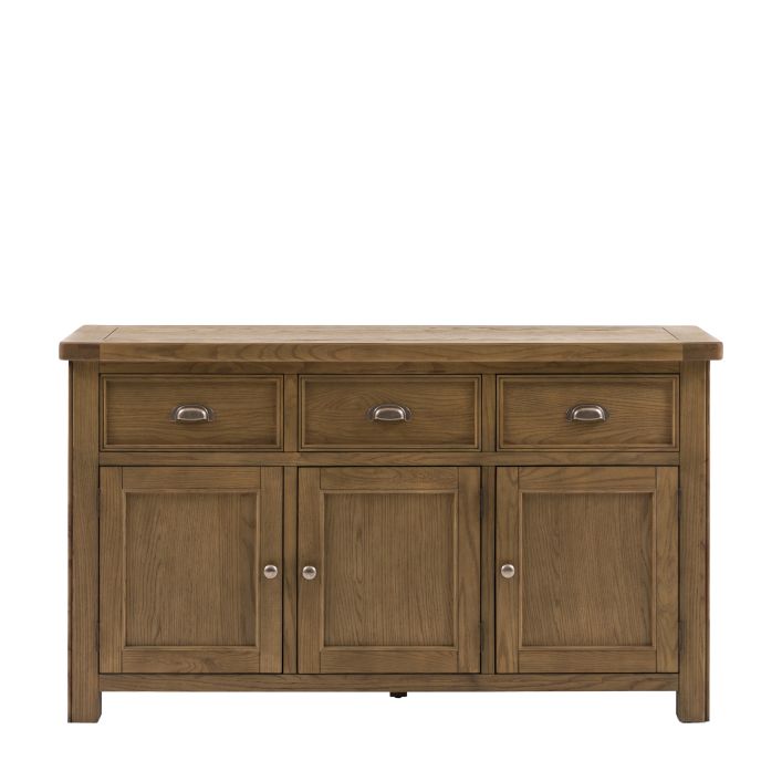 Gallery Direct Hardwick 3 Door 3 Drawer Sideboard constructed from solid oak and veneers in a warm natural wood finish, with chic metal handles