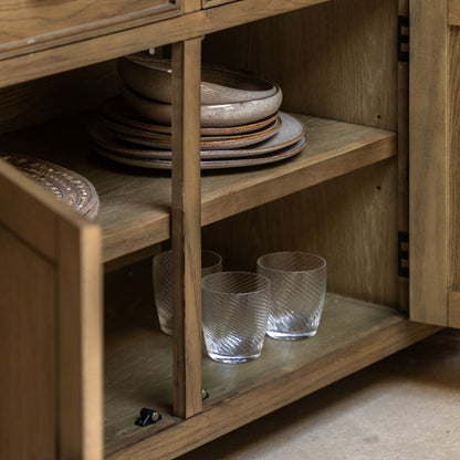 Gallery Direct Hardwick 3 Door 3 Drawer Sideboard combines practical storage with refined aesthetics. Internal shelves within the 3 cupboards and 3 top drawers