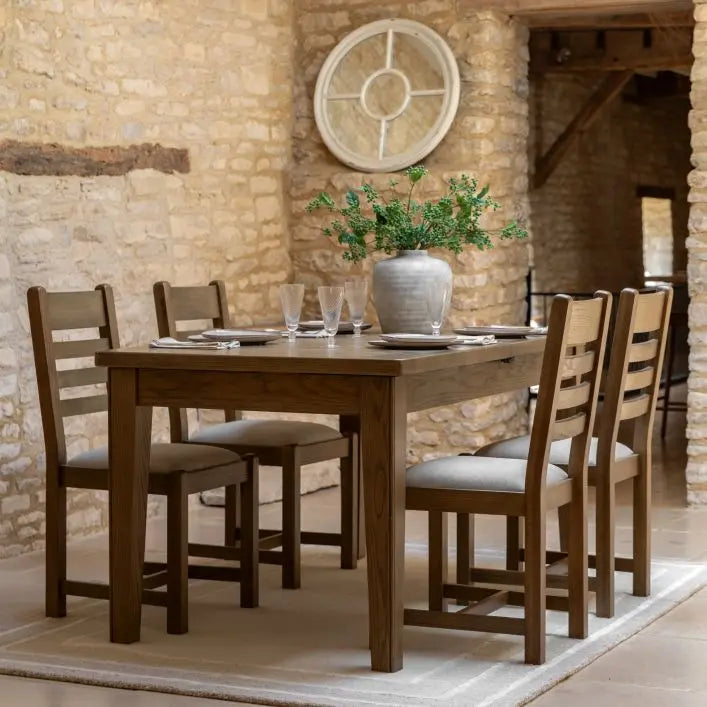 Gallery Direct Hardwick Extending Dining Table that can seat between 6-8 people with a robust construction and warm natural wood finish