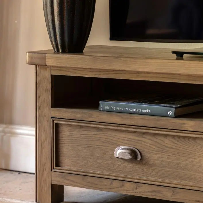 Gallery Direct Hardwick Media Unit features 2 storage drawers and a media shelf crafted from oak solid woods and veneers with chic metal pull handles 