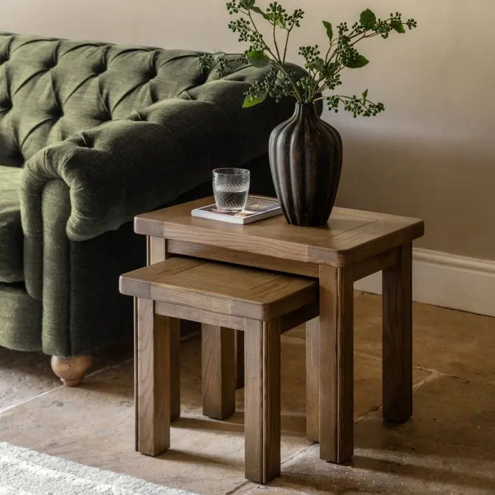 Gallery Direct Hardwick Nest of 2 Rectangular Tables crafted from solid oak and veneers with a natural warm wood finish that can be stacked together or used separately 