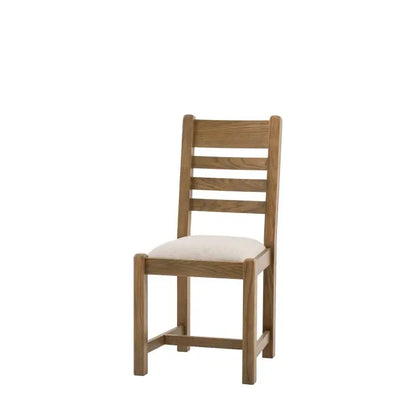 Gallery Direct Hardwick Pair of Dining Chairs features a generously padded seat and a slatted back rest crafted from oak wood and veneers in a warm natural wood finish