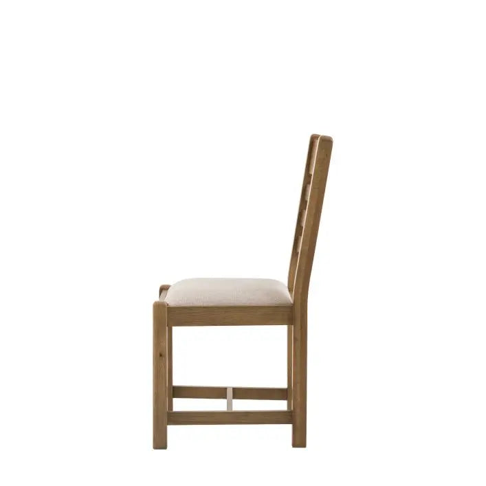 Gallery Direct Hardwick Pair of Dining Chairs featuring a robust wooden frame with distinctive slatted back design, these chairs deliver both structural integrity and visual appeal. 