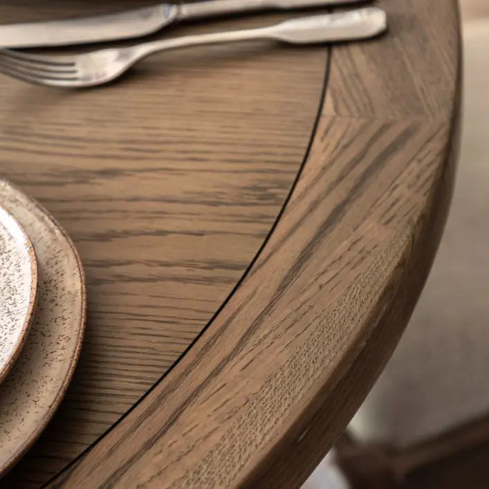 Gallery Direct Hardwick Round Extending Dining Table crafted from oak solids and veneers with a natural warm wood finish