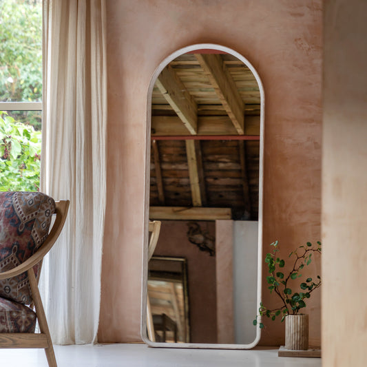 Gallery Direct Helsinki Arch Leaner Mirror Limed Oak displayed in a styled interior