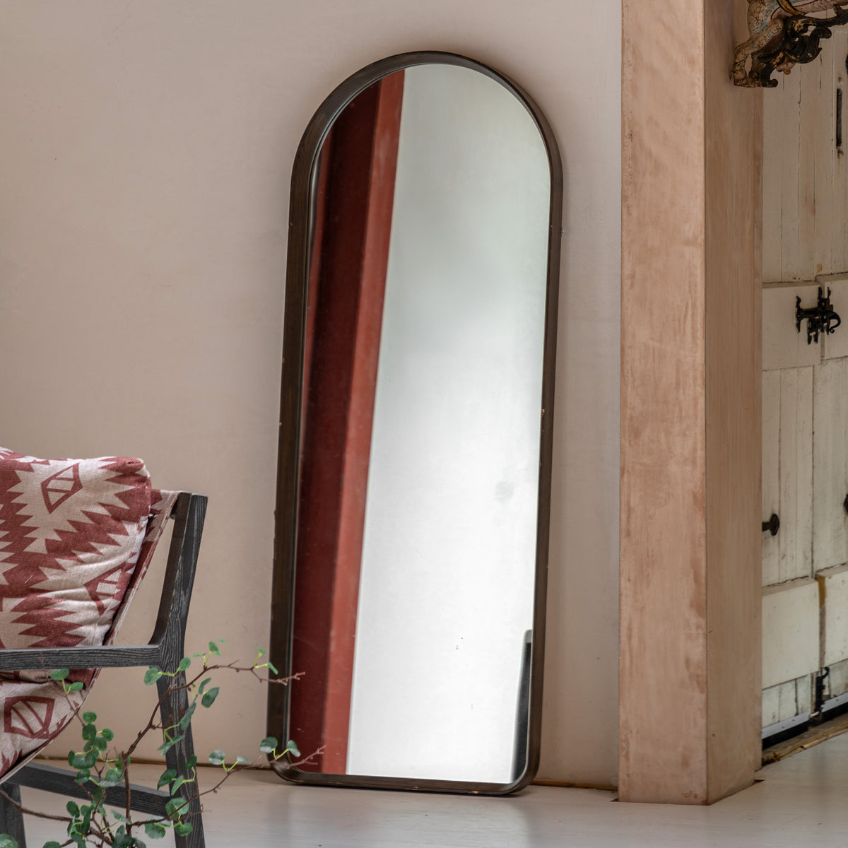 Gallery Direct Helsinki Arch Leaner Mirror Walnut displayed in a styled interior