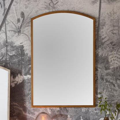 Gallery Direct Higgins Arch Mirror Antique Gold displayed in a styled interior