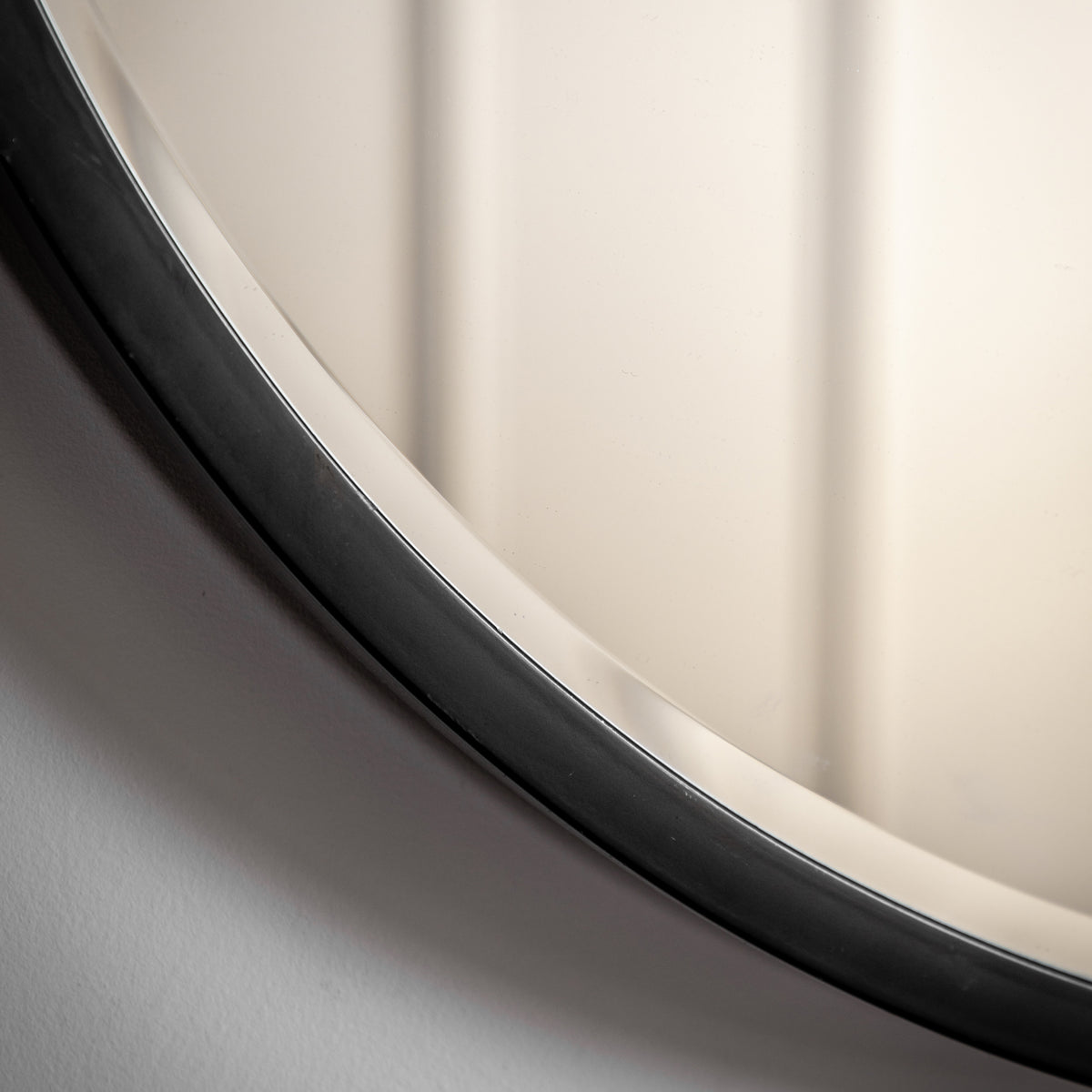 Gallery Direct Higgins Round Mirror Black, close-up of the mirror and frame details