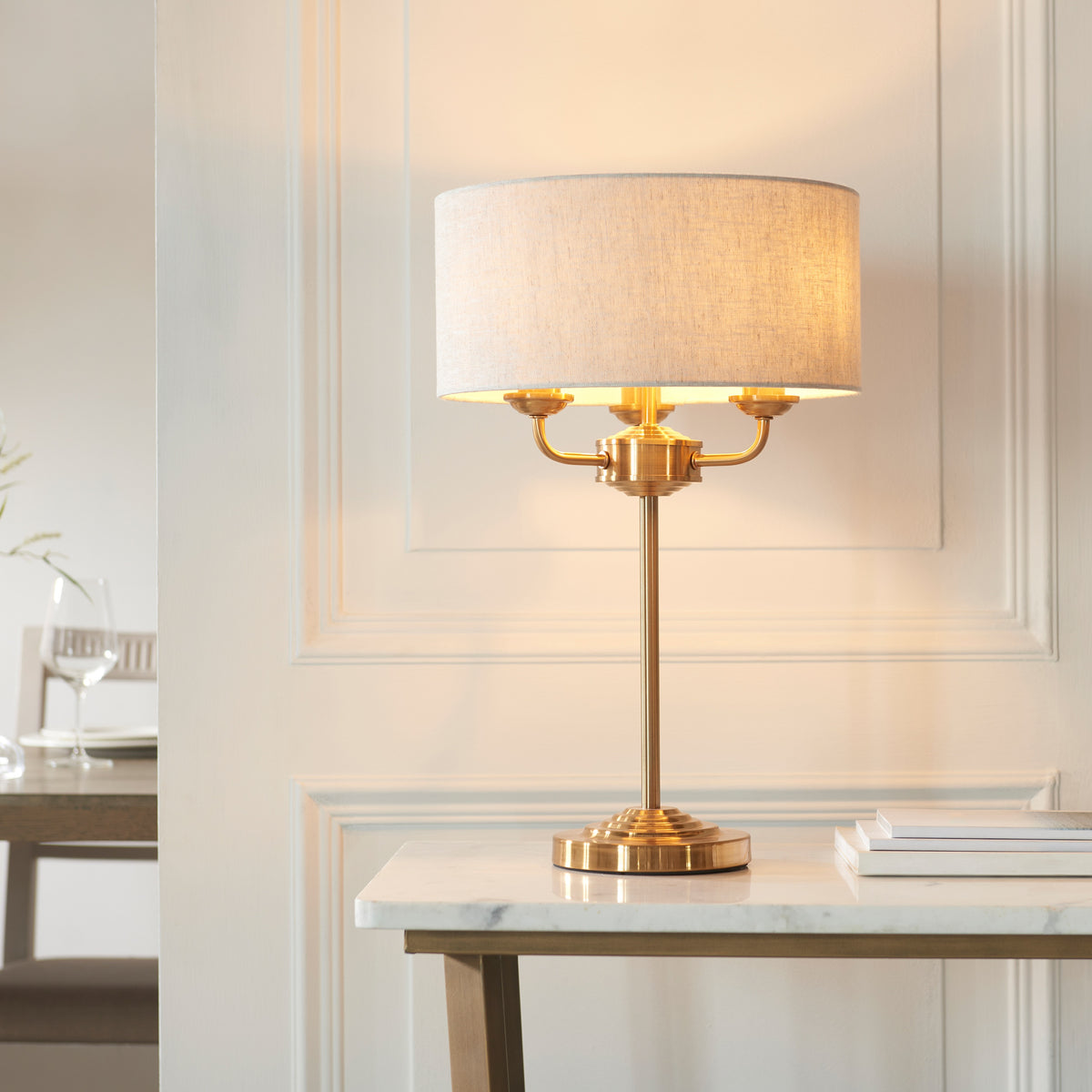Gallery Direct Highclere 3 Table Lamp Vintage Brass, styled in a room setting