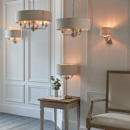 Gallery Direct Highclere 3 Table Light Chrome & Natural Linen, styled in a room setting