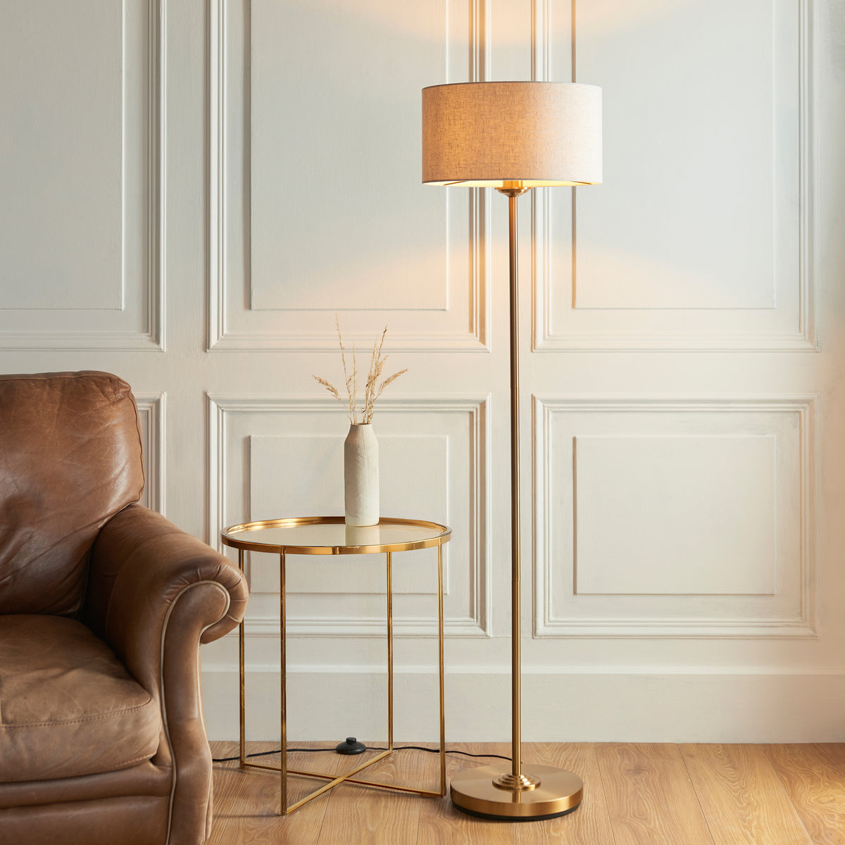 Gallery Direct Highclere Floor Lamp Vintage Brass, styled in a room setting