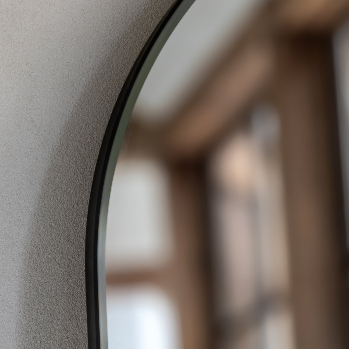 Gallery Direct Holworth Arch Mirror Black, close-up of the mirror and frame details