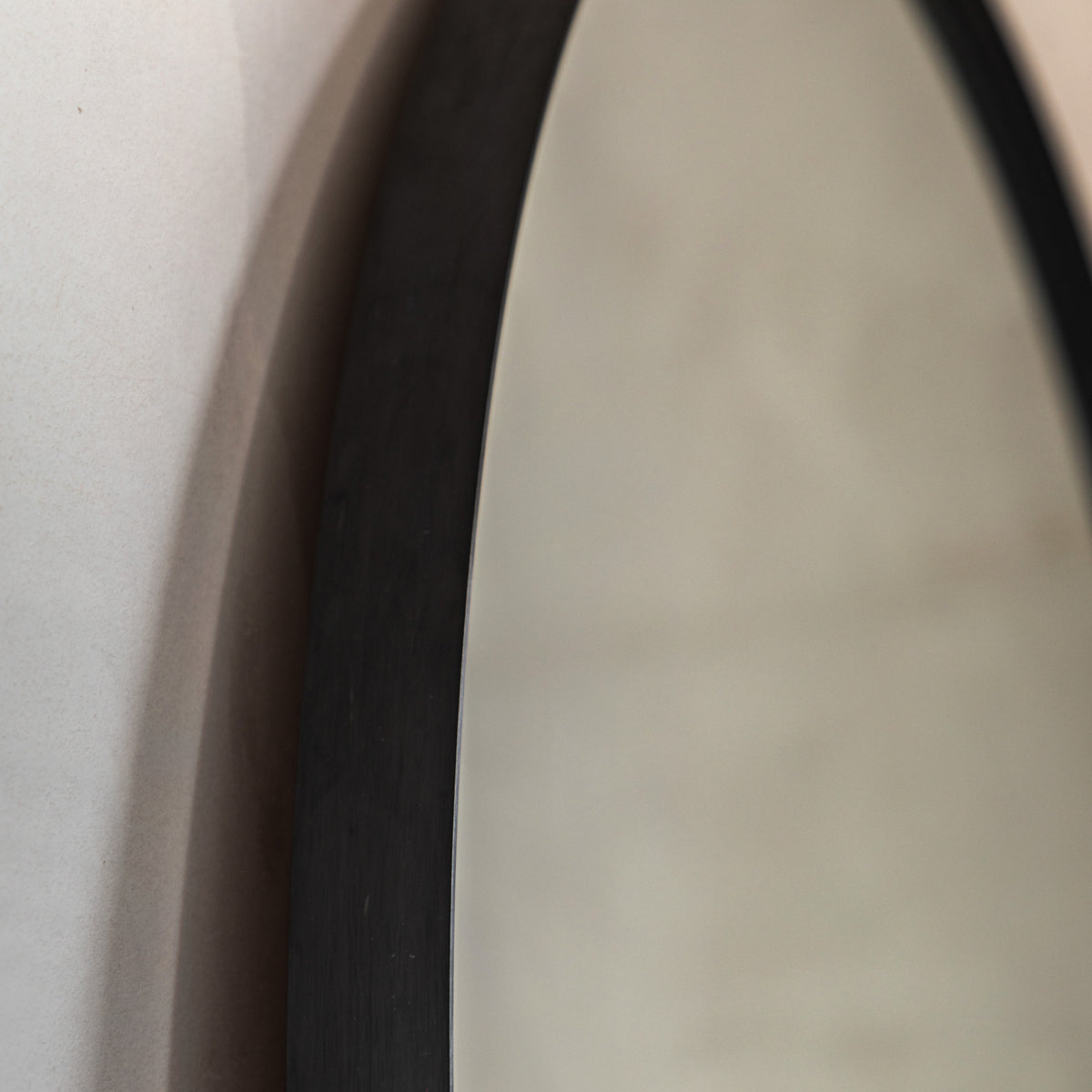 Gallery Direct Holworth Arch Mirror Black, close-up of the mirror and frame details