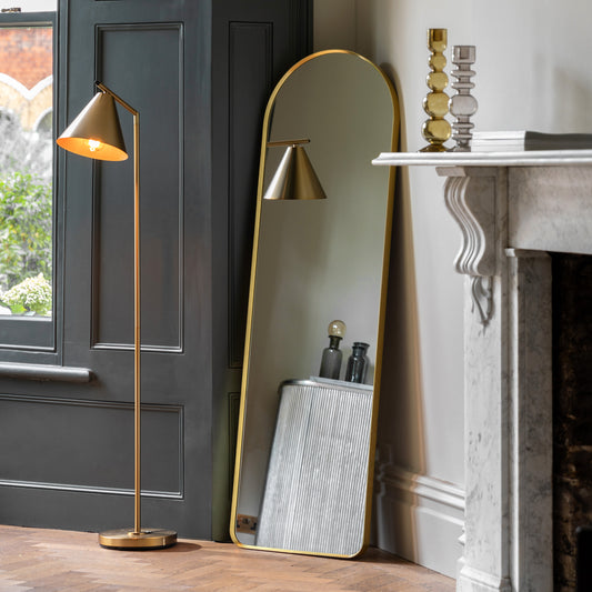 Gallery Direct Holworth Arch Mirror Gold displayed in a styled interior