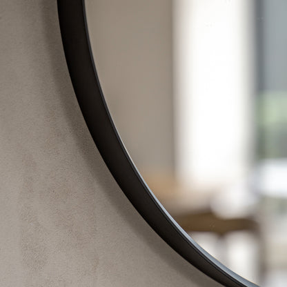 Gallery Direct Holworth Pebble Mirror Black, close-up of the mirror and frame details