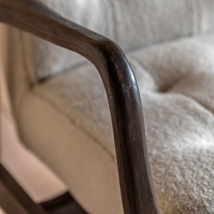 Gallery Direct Humber Armchair in Cream Faux Sheepskin upholstery with a solid dark ash wood frame