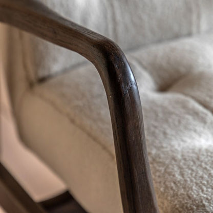 Gallery Direct Humber Armchair in Cream Faux Sheepskin upholstery with a solid dark ash wood frame