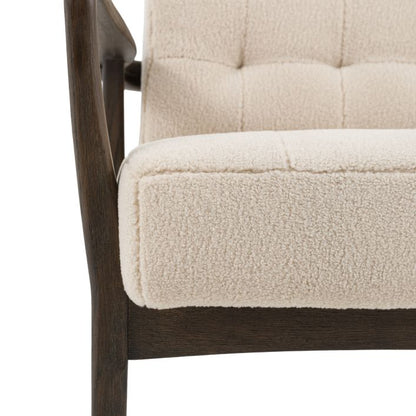 Gallery Direct Humber Armchair upholstered in Cream Faux Sheepskin fabric with a dark wooden frame
