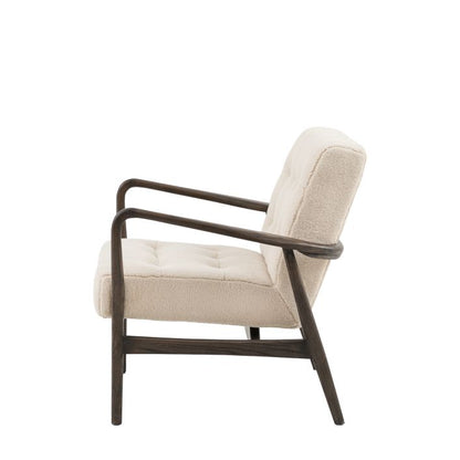 Gallery Direct Humber Armchair in Cream Faux Sheepskin padded seat and backrest cushion, with a dark ash wood frame