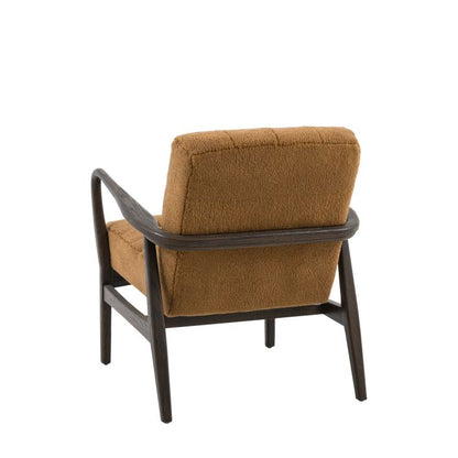 Gallery Direct Humber Armchair upholstered in Ochre Faux Sheepskin material with a dark wooden frame