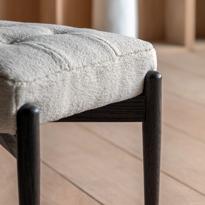 Gallery Direct Humber Footstool in Cream Faux Sheepskin with dark wooden legs