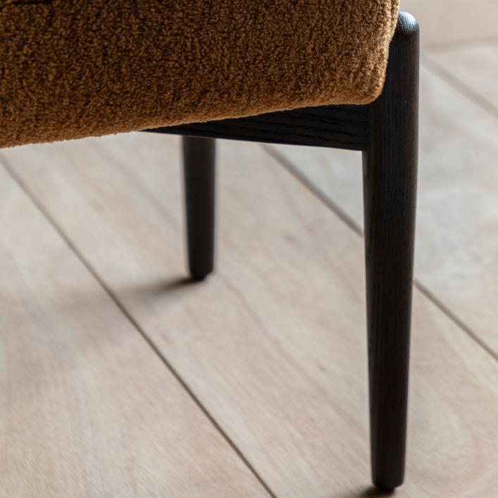 Gallery Direct Humber Footstool in Ochre Faux Sheepskin with solid dark wooden base and legs