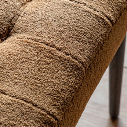 Gallery Direct Humber Footstool upholstered in a plush Faux Sheepskin, Ochre coloured fabric, complemented by dark wooden legs