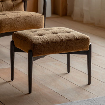 Gallery Direct Humber Footstool upholstered in a tactile Faux Sheepskin, Ochre coloured material with dark wooden legs